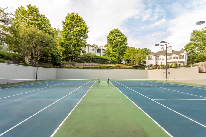 Pointe at Canyon Ridge offers an enclosed area for tennis enthusiasts with two courts surrounded by the apartments.