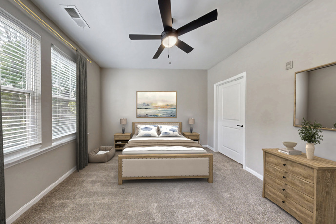 A cozy bedroom with sunny yellow walls and a comfortable bed.