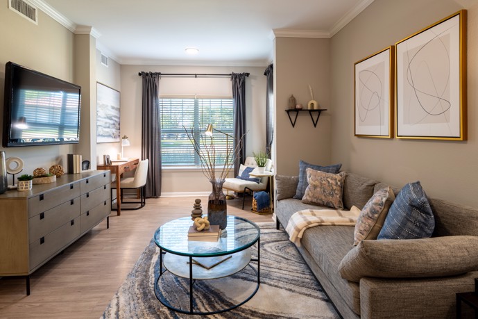 The Pointe at Vista Ridge open-floor plan apartment with a wood-style flooring