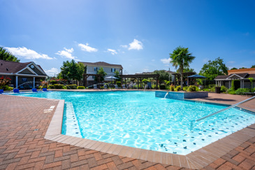 An expansive pool ready for residents to enjoy outside the Waterford Place at Riata Ranch clubhouse.