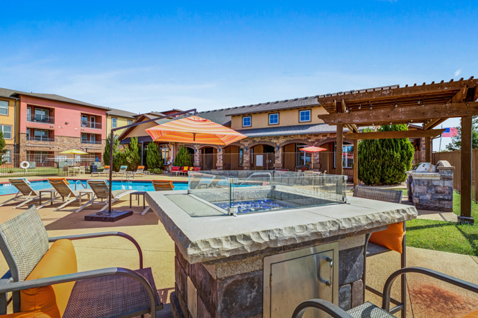 Firepit lounge at pool area.