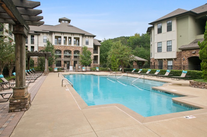 The sparkling pool area at Tapestry Park in Birmingham, AL, inviting residents to relax and unwind under the sun.