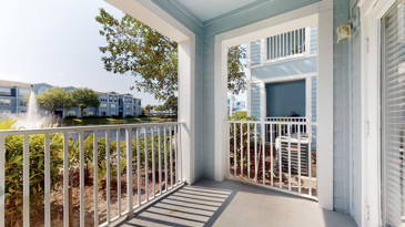 An apartment patio at The Enclave at Tranquility Lake, ideal for relaxation and gatherings.