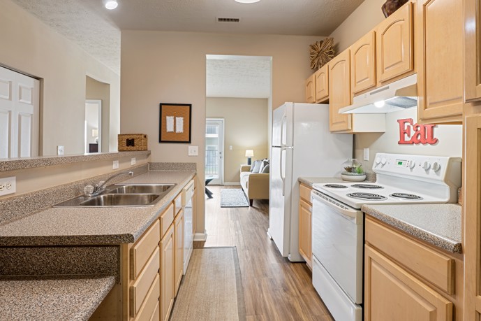 The interior of Runaway Bay, designed for both functionality and style with sleek countertops, stainless steel appliances, and ample storage space