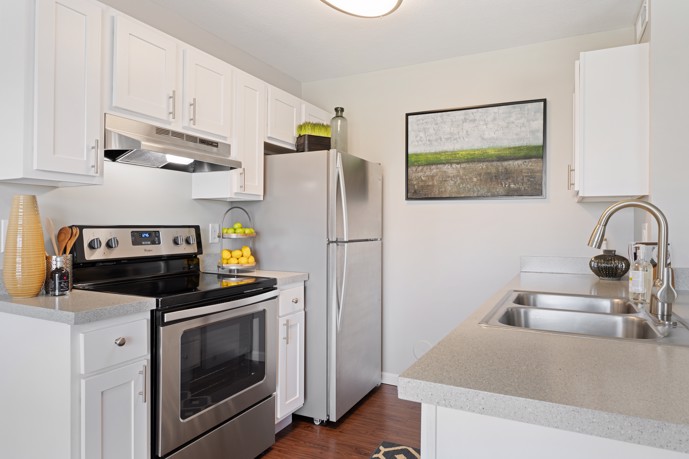 Modern and well-equipped kitchen at Schirm Farms, featuring contemporary appliances and ample countertop space