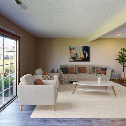 A prominent brick Hilliard Park sign, adorned with flowers, trees, and bushes, serves as a picturesque focal point within the landscape.