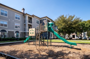 The playground at The Pointe at Vista Ridge is located in front of the apartments, providing a fun and safe outdoor space to play.