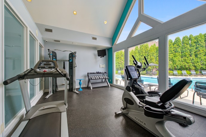 A state-of-the-art fitness center within the community, equipped with a variety of exercise machines, free weights, and cardio equipment, offering residents a convenient space to maintain an active lifestyle and achieve their fitness goals.