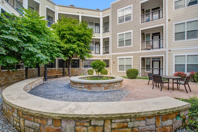The well kept stone courtyard at Reveal on Cumberland which offers a peaceful retreat just outside the apartments. 