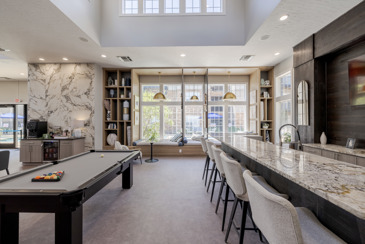 Clubhouse view with extravagant furnishings and tons of natural light at The Chelsea.