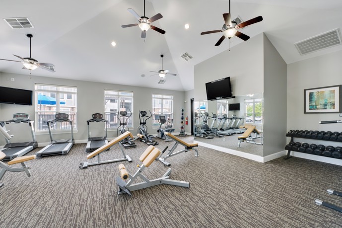 A well-equipped fitness center with cardio machines, weights, and exercise equipment, offering residents a convenient space to pursue their fitness goals.