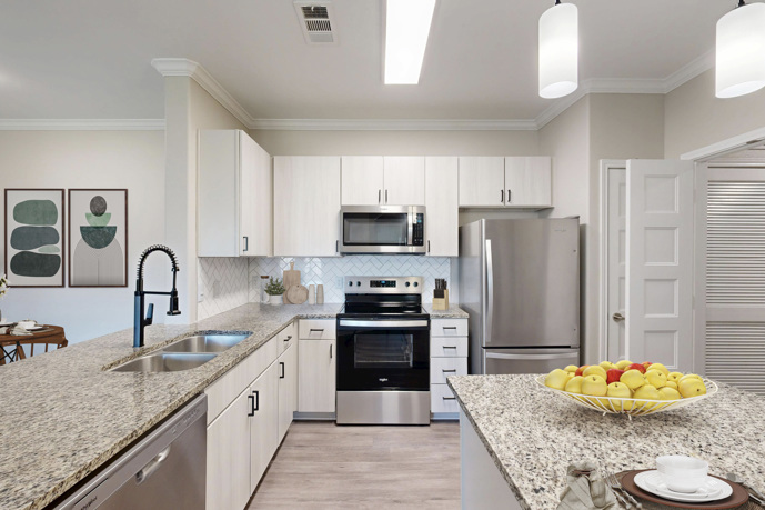 A newly renovated kitchen with a kitchen island at The Shores.