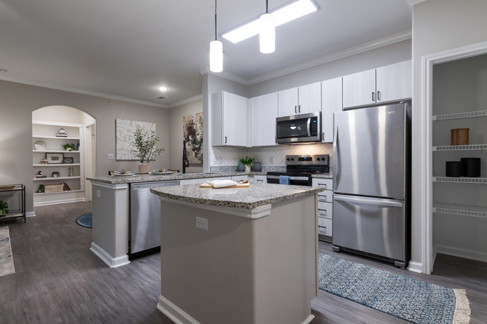 A newly renovated kitchen with a kitchen island at The Shores.