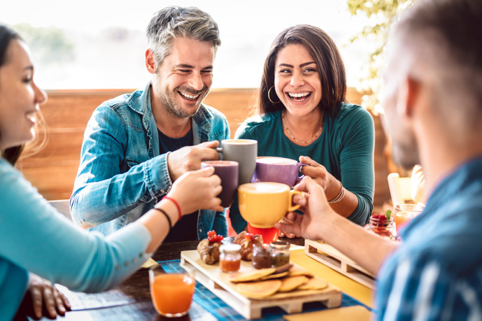 Photo of friends drinking coffee.