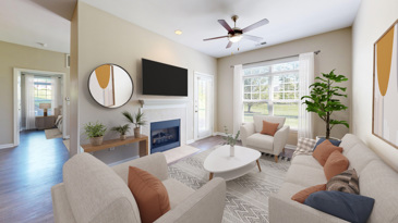 Apartment living room with seating facing a flat screen tv over a gas fireplace and the dining area in the background