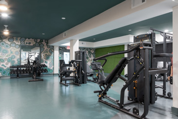 Brand new fitness center with free-weights and machines