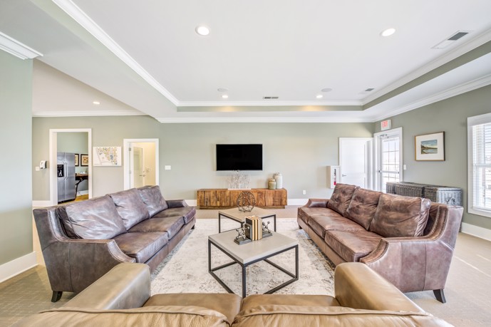 Large seating area of the community clubhouse at Double Creek Flats apartments in Plainfield, IN