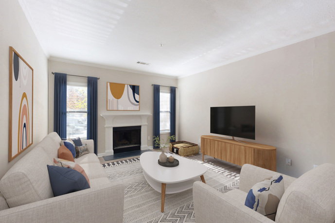 White cabinets and white stove top oven in kitchen at Sugar Mill apartments.