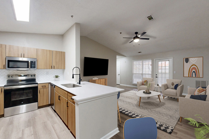 Newly renovated kitchen with quartz countertops and new cabinets.