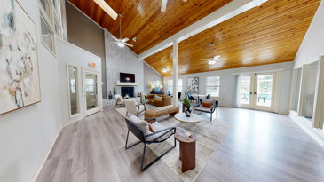  A spacious and modern clubhouse interior with contemporary furnishings and a welcoming atmosphere at Windrush apartments.