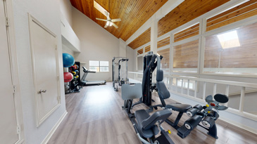 Windrush features a modern and well-equipped fitness facility with exercise machines, weights, and ample space for workouts.