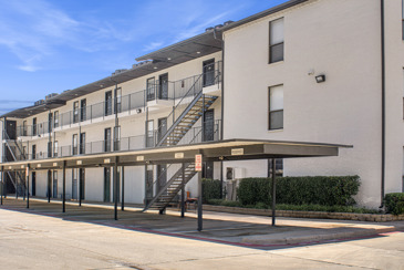 Vue at Knoll Trail apartments with a large sign saying "Vue" in front.