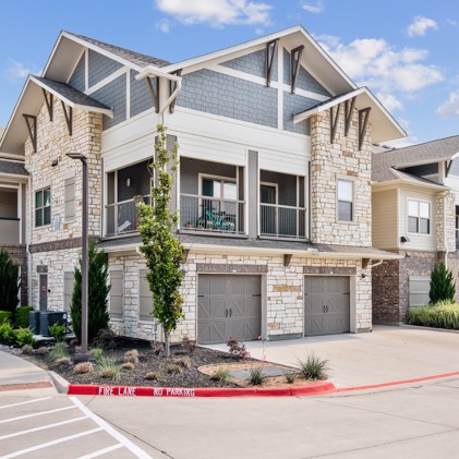 The exterior showcases the modern architecture and landscaped surroundings of Adley Craig Ranch.