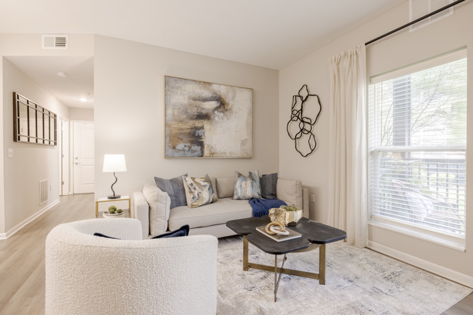 A modern apartment featuring an inviting living room at The Chelsea.