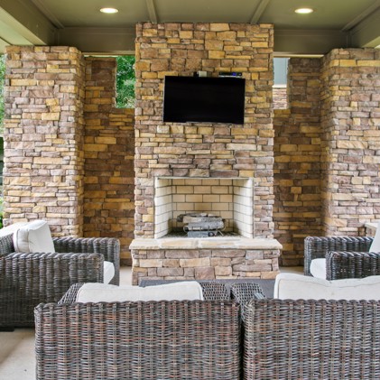 A cozy patio at Tapestry Park in Birmingham, AL, offering residents a charming outdoor retreat to relax and enjoy the fresh air.