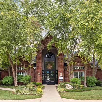 The exterior of the leasing office building, featuring modern architecture, a well-maintained facade, and landscaping, providing a professional and welcoming entrance for prospective residents.